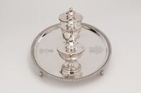 2013.10.1-7 - George III silver inkstand, 1789, with pots 1798, presented to Matthew Baillie by Queen Charlotte in 1810, side view.jpg; 2013.10/1; Inkstand; Inkstand